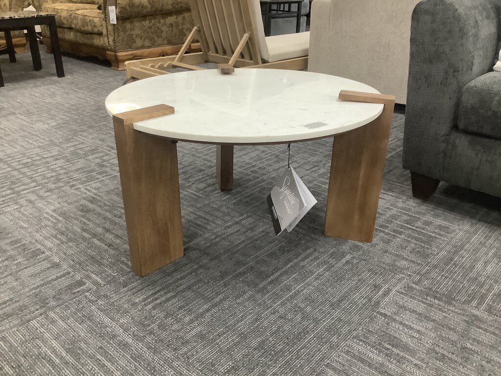 76910 - Ashley Isanti Round Marble Top Cocktail Table 32x32x18