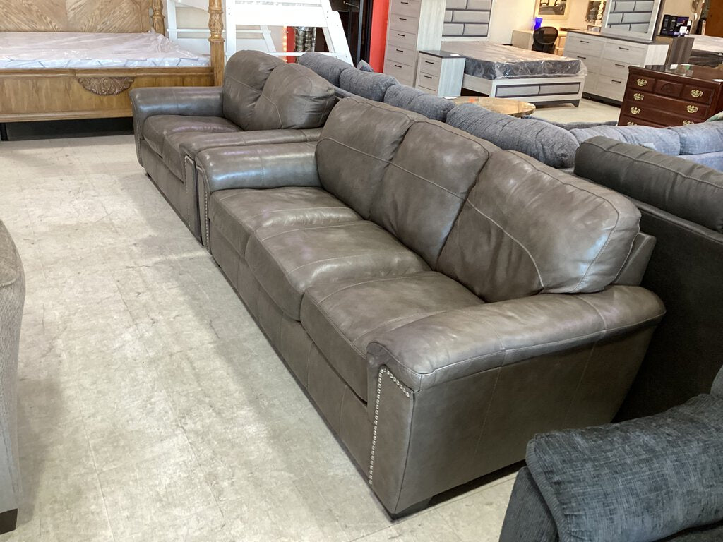 82143 - Ashley Donnell Leather Match Sofa & Loveseat 89/66x39x35