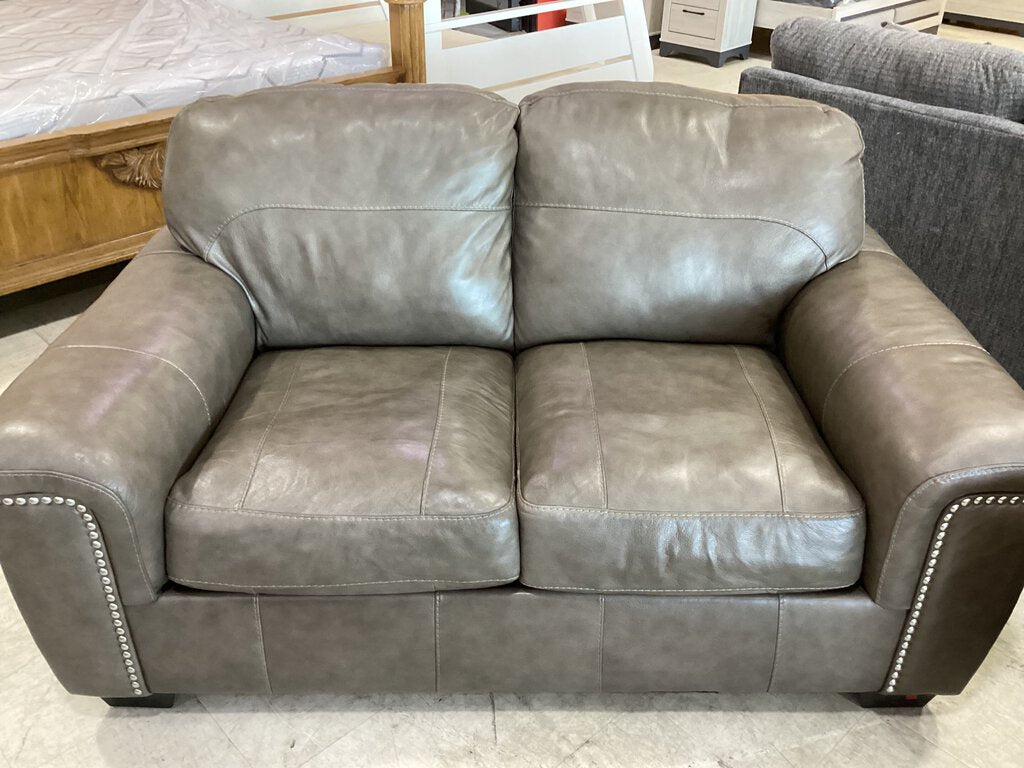 82143 - Ashley Donnell Leather Match Sofa & Loveseat 89/66x39x35