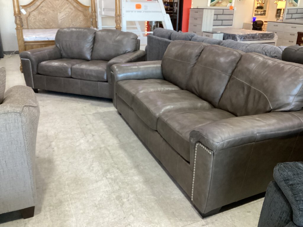 82143 - Ashley Donnell Leather Match Sofa & Loveseat 89/66x39x35