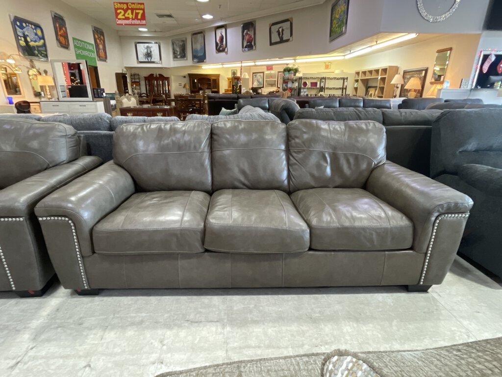 82143 - Ashley Donnell Leather Match Sofa & Loveseat 89/66x39x35