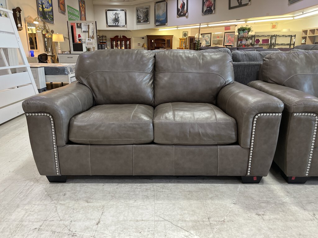 82143 - Ashley Donnell Leather Match Sofa & Loveseat 89/66x39x35